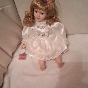 Charming White Doll with Blonde Hair